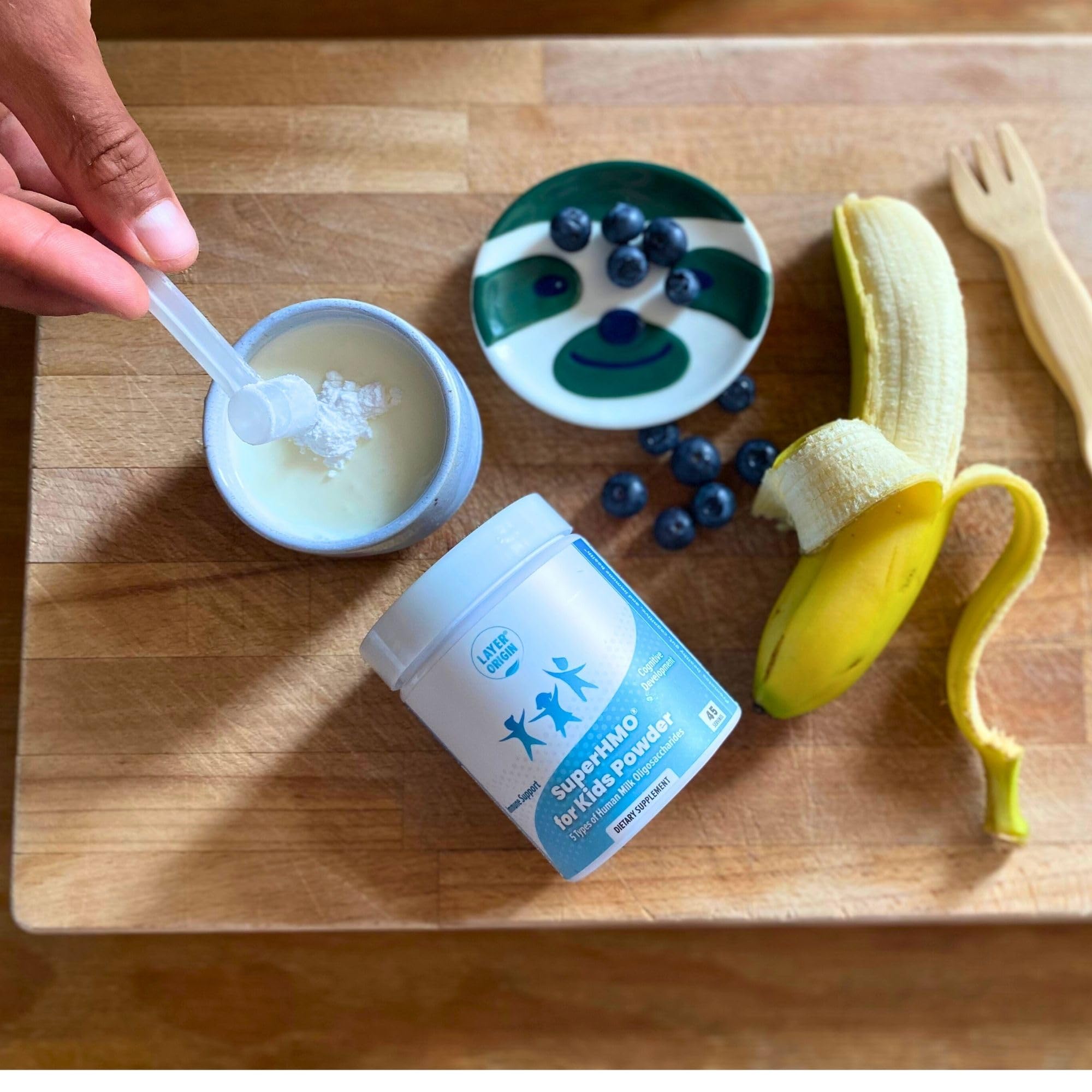 Layer Origin SuperHMO kids cereal mix to support breakfast routines.