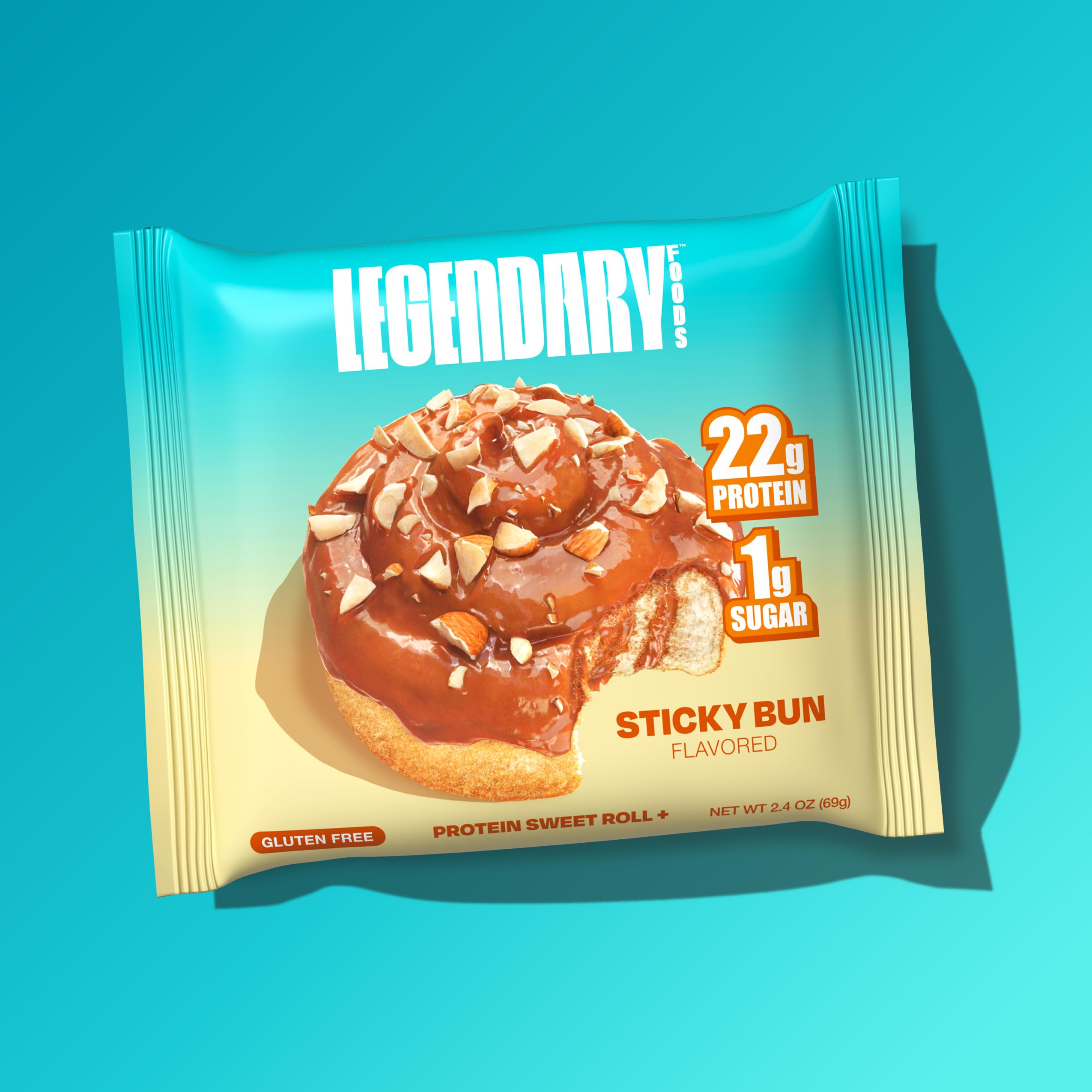 Legendary Foods Cinnamon Roll bar in hand, ideal for busy days and meal replacements.