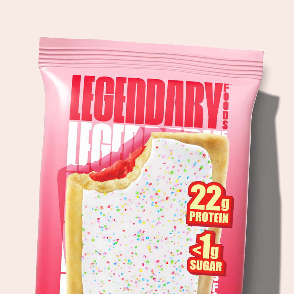 Legendary Foods frosted strawberry pastry with coffee, morning energy boost.