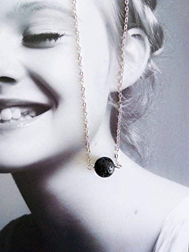 Lenoup brass-platinum chain detail emphasizes durable, stylish craftsmanship.