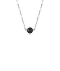 Lenoup lava stone diffuser necklace close-up shows the bead ready to diffuse essential oils.
