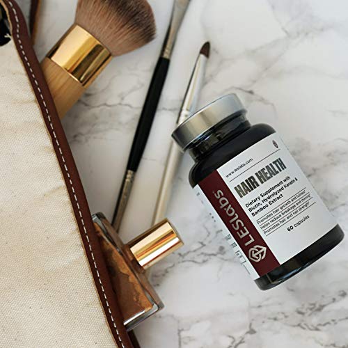 LES Labs Hair Health usage scene with hands and hair focus