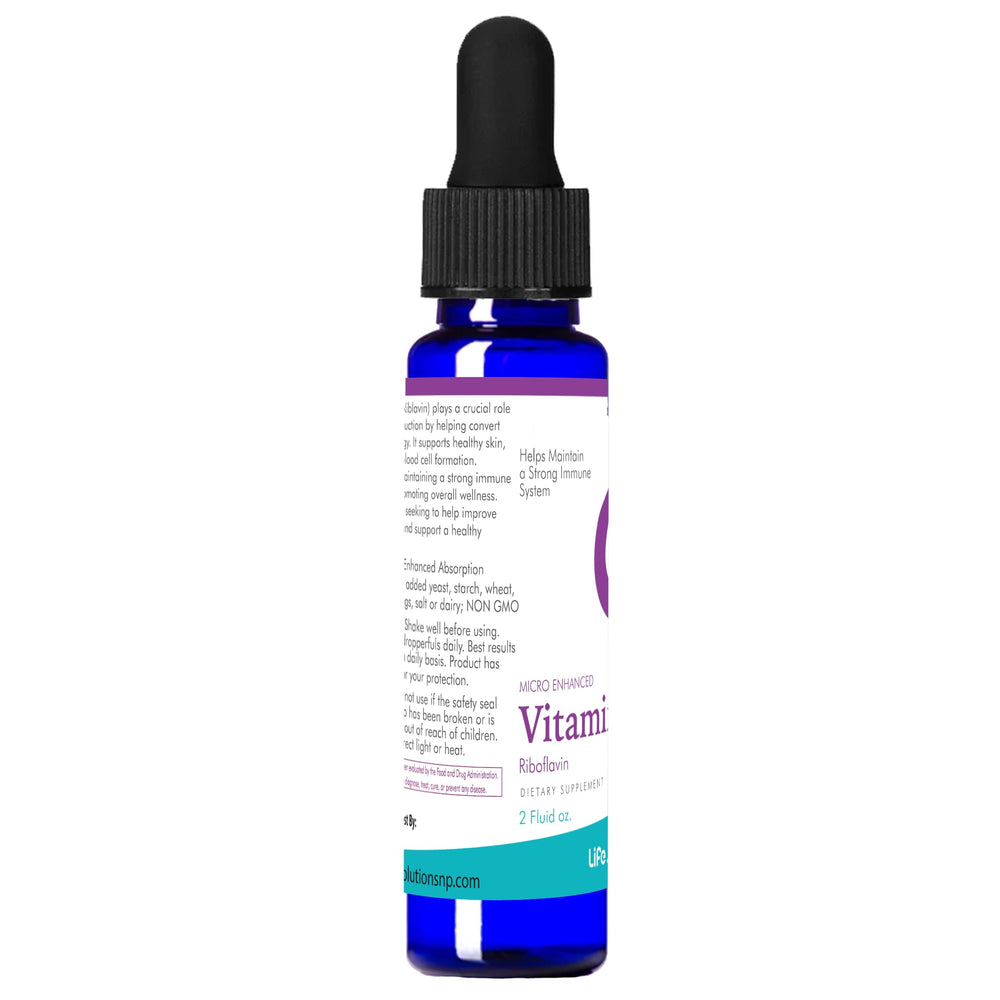 Life Solutions Vitamin B2 bottle with glow effects suggesting healthy skin support