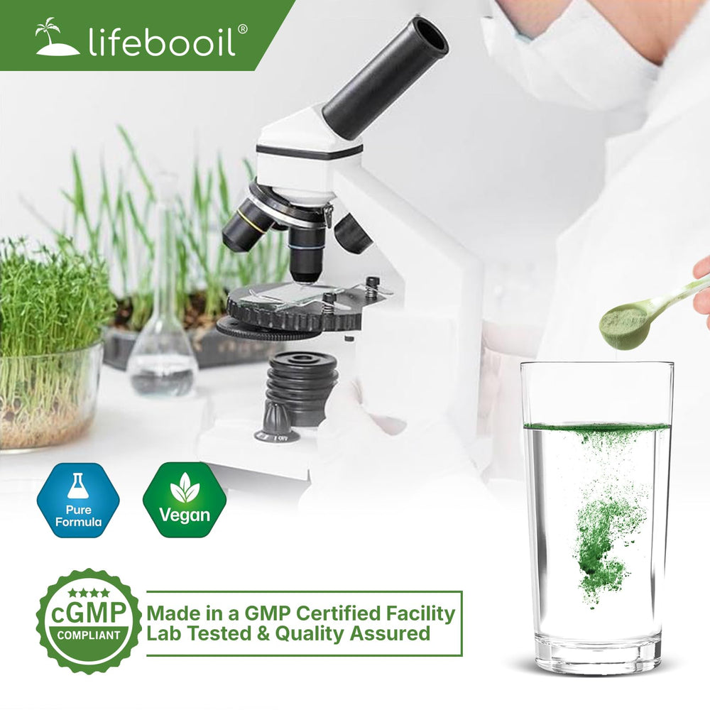 Glass of Lifebooil Chlorophyll Powder mixed with water and lime twist