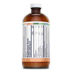 Pouring LIFETIME Bone Support Liquid into a glass for convenient daily use.