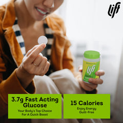 Lift Glucose tablet on hand demonstrates portable energy in a chewy form.