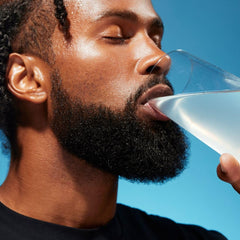 Liquid I.V. Hydration Multiplier Mango mixed drink in a glass with mango flavor