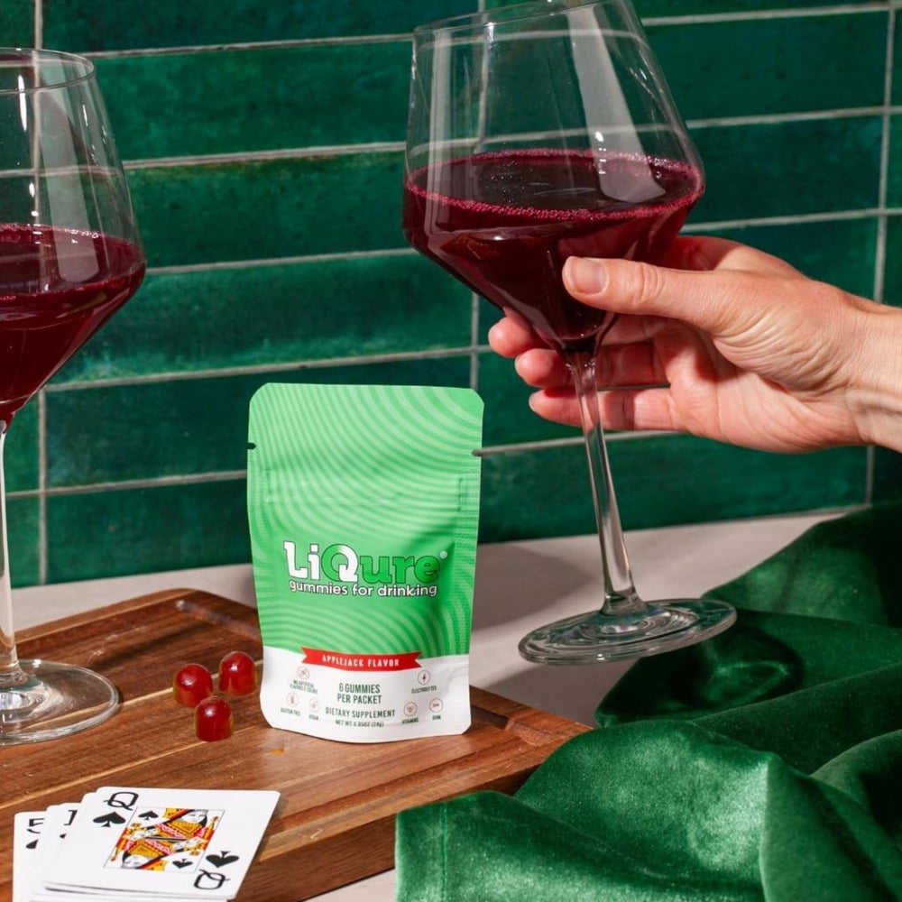 LiQure Gummies for Drinking on a bedside tray for morning refresh