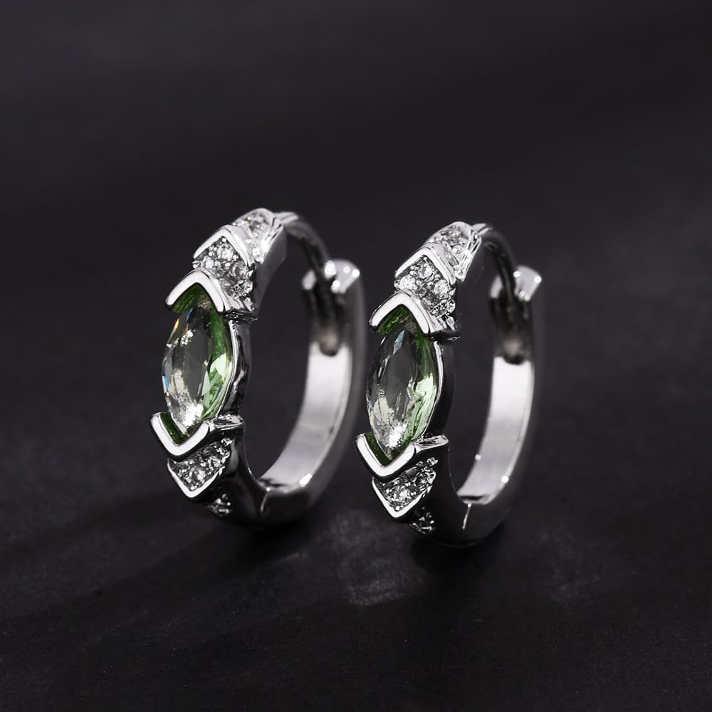 LIU JUN moissanite closeup reveals a sparkling stone on a healing-inspired hoop.
