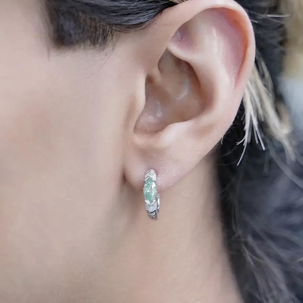 LIU JUN titanium ion drainage hoop highlights modern wellness-inspired jewelry.