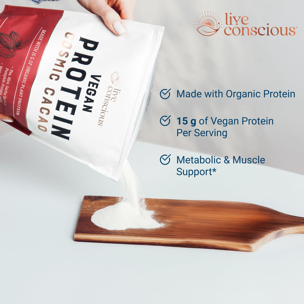 Live Conscious Cosmic Cacao scoop pouring powder for a post-workout shake.