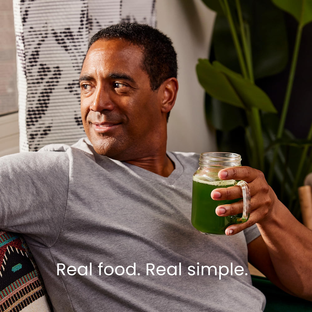 LIVE IT UP Super Greens mixed in water creates a vibrant daily boost.
