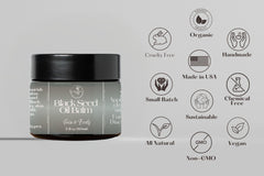 Close-up of Living Farms balm ingredients: organic black seed oil, kokum butter