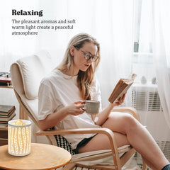 LnJPan ceramic wax burner white complements modern interiors with a soft glow.