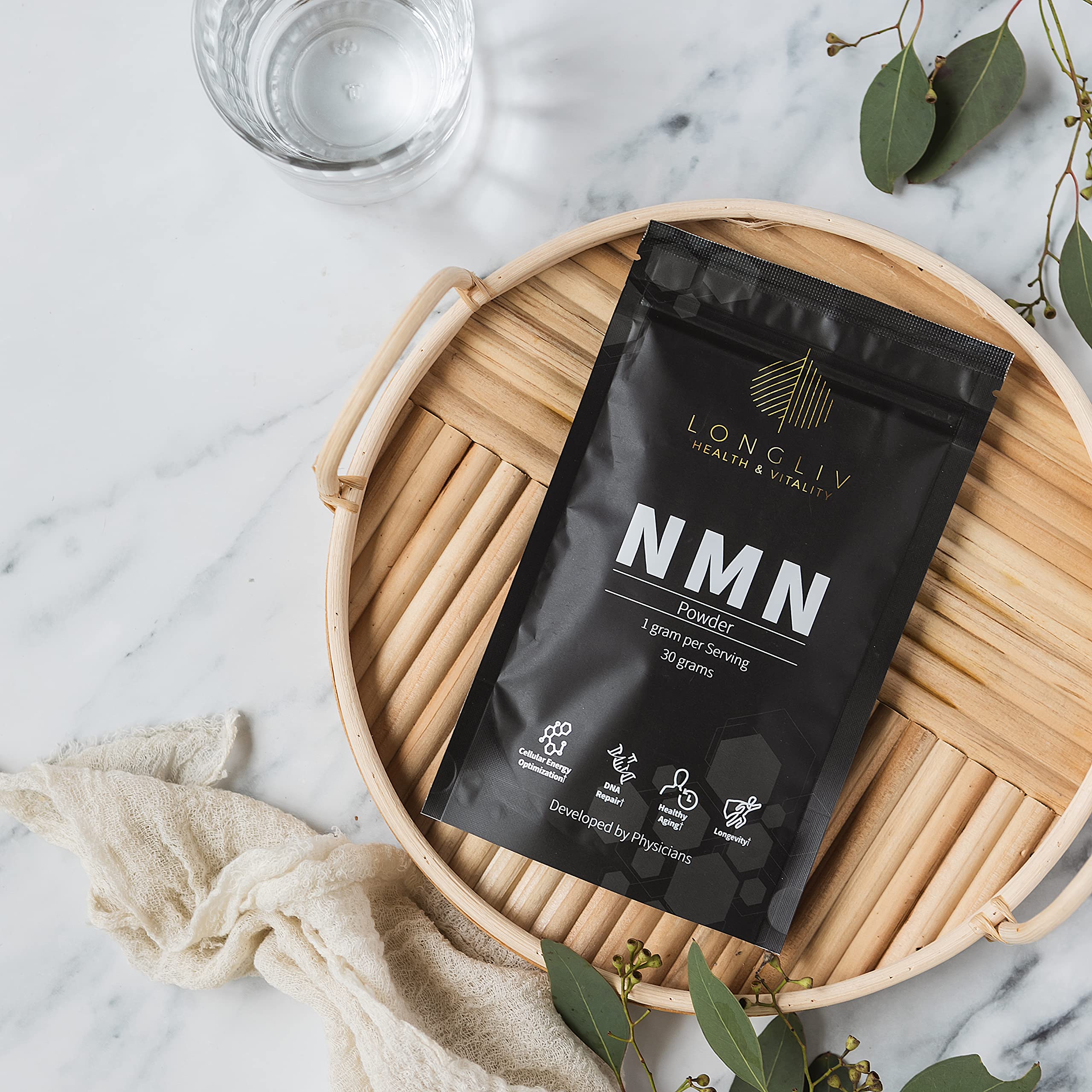 LongLiv NMN powder in jar with label highlighting GMP and third-party testing.