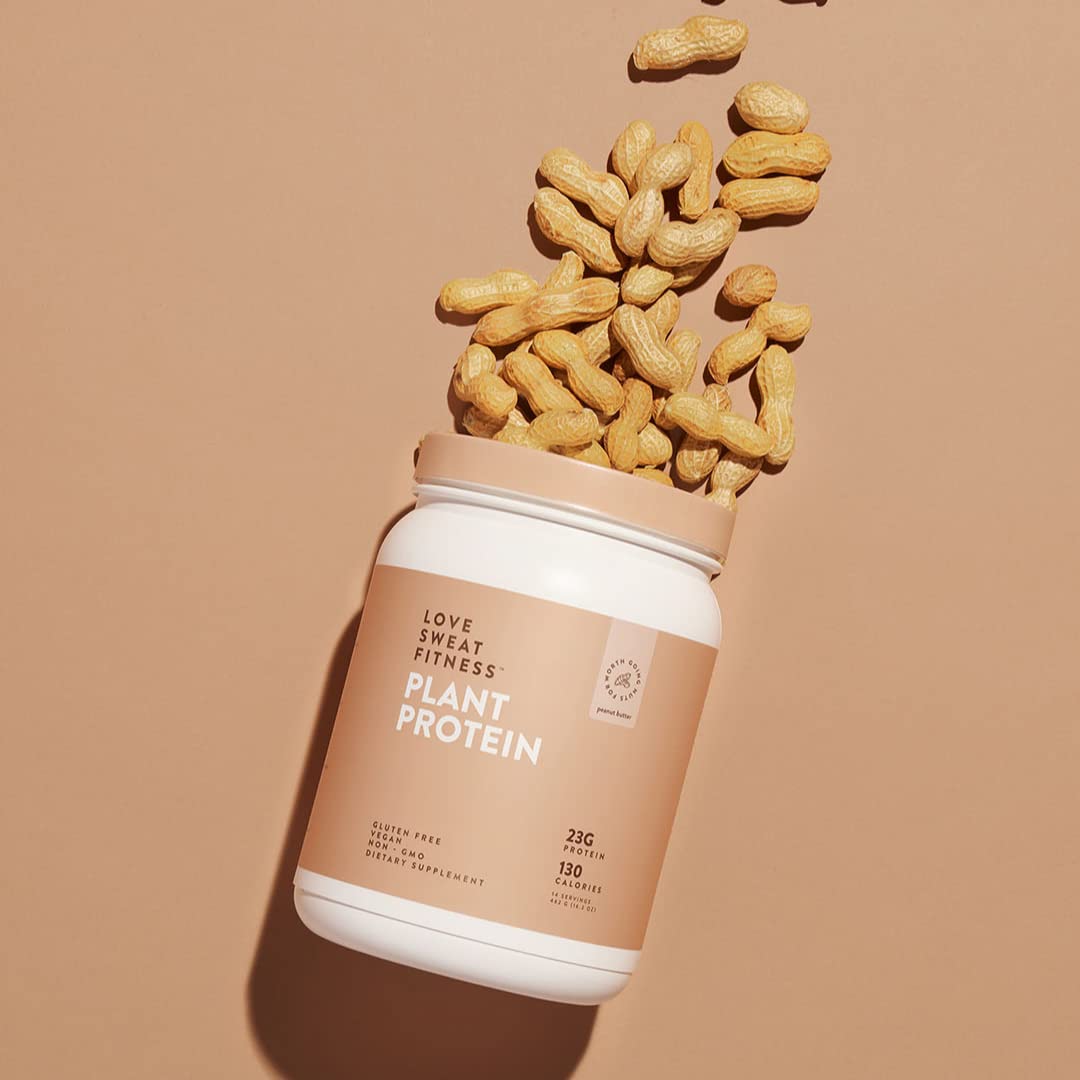 Love Sweat Fitness peanut butter flavored shake poured into glass for protein.