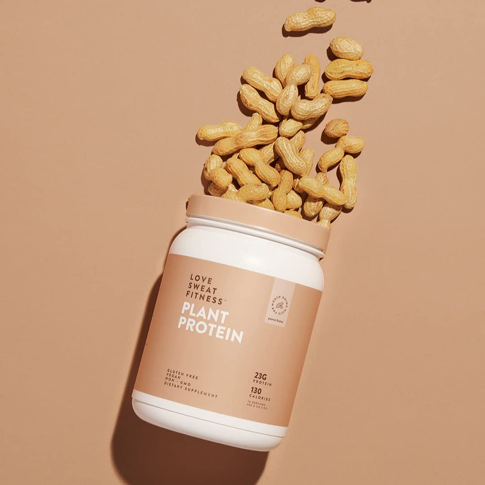 Love Sweat Fitness peanut butter flavored shake poured into glass for protein.