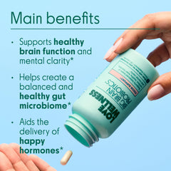 Love Wellness Big Brain Probiotics capsules closeup for mood and focus benefits.