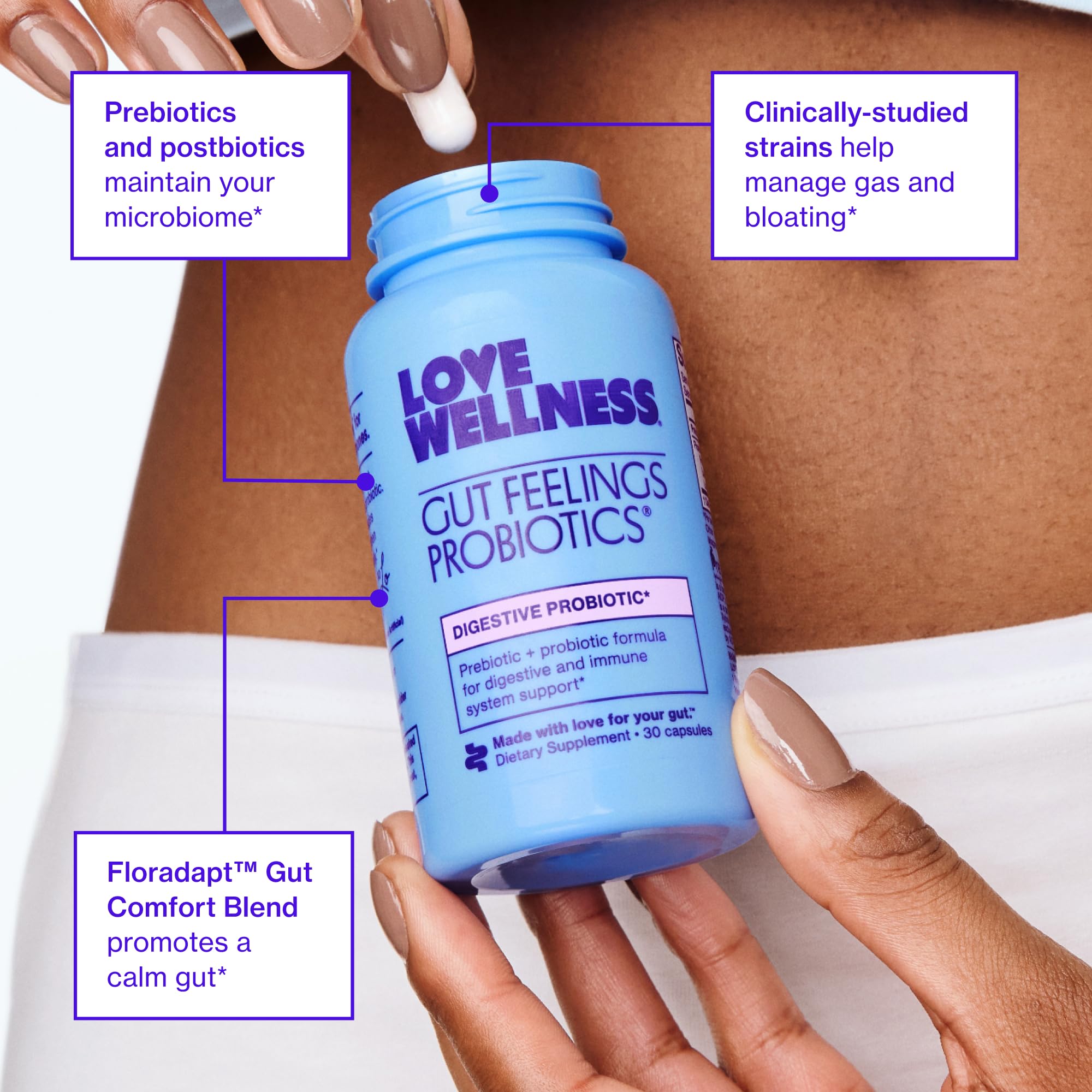 Open capsule of Love Wellness Gut Feelings Probiotic ready to mix into a beverage
