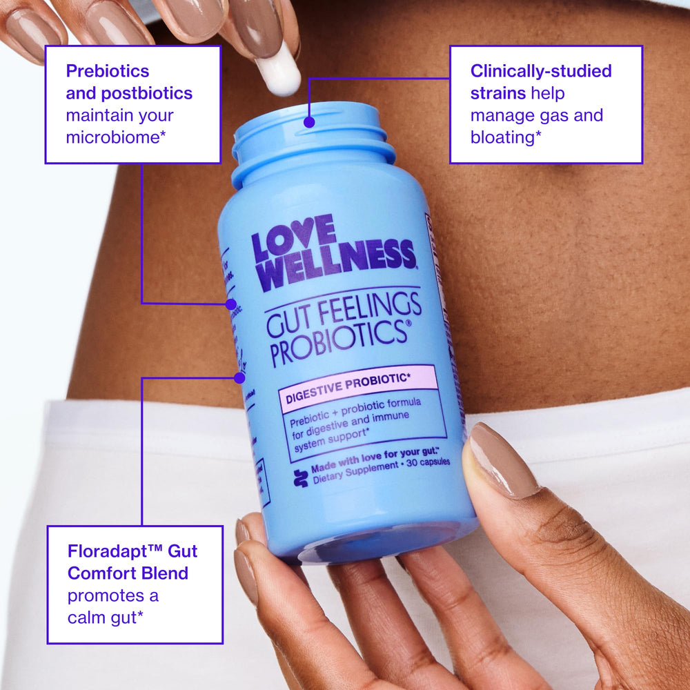 Open capsule of Love Wellness Gut Feelings Probiotic ready to mix into a beverage