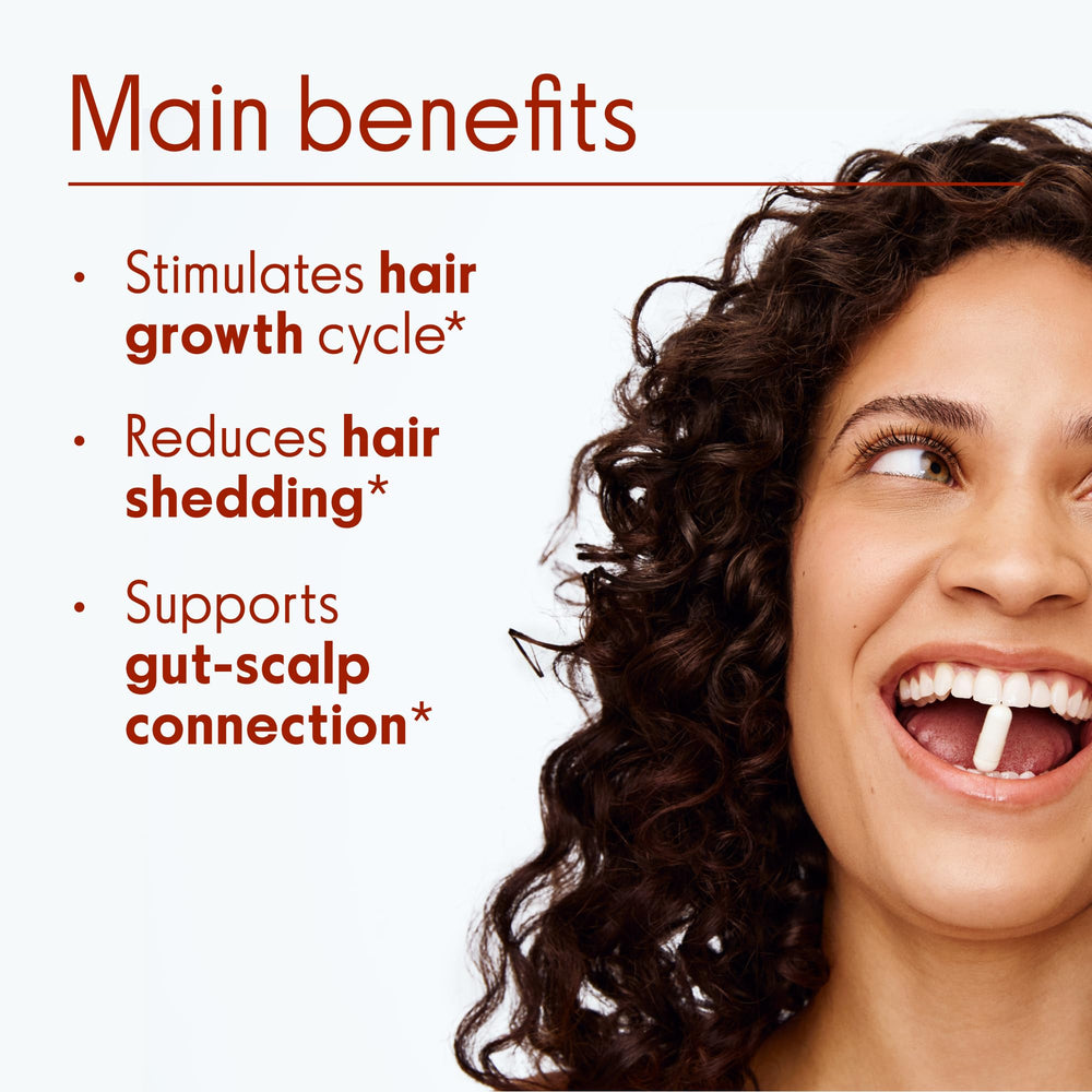 Capsules from Love Wellness Healthy Hair Probiotics for daily use.