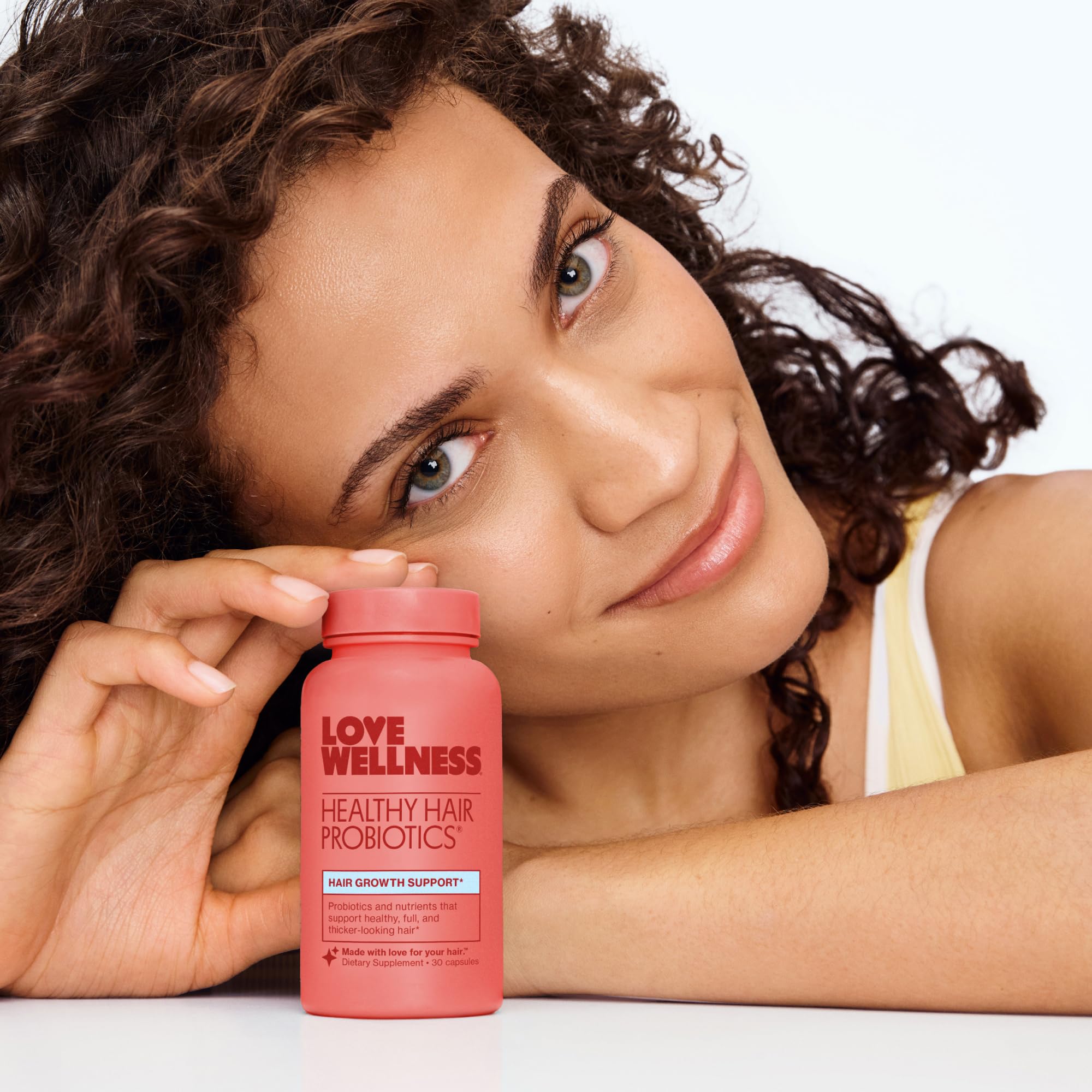 Vegan-friendly, dairy-free Love Wellness Probiotics packaging shown.