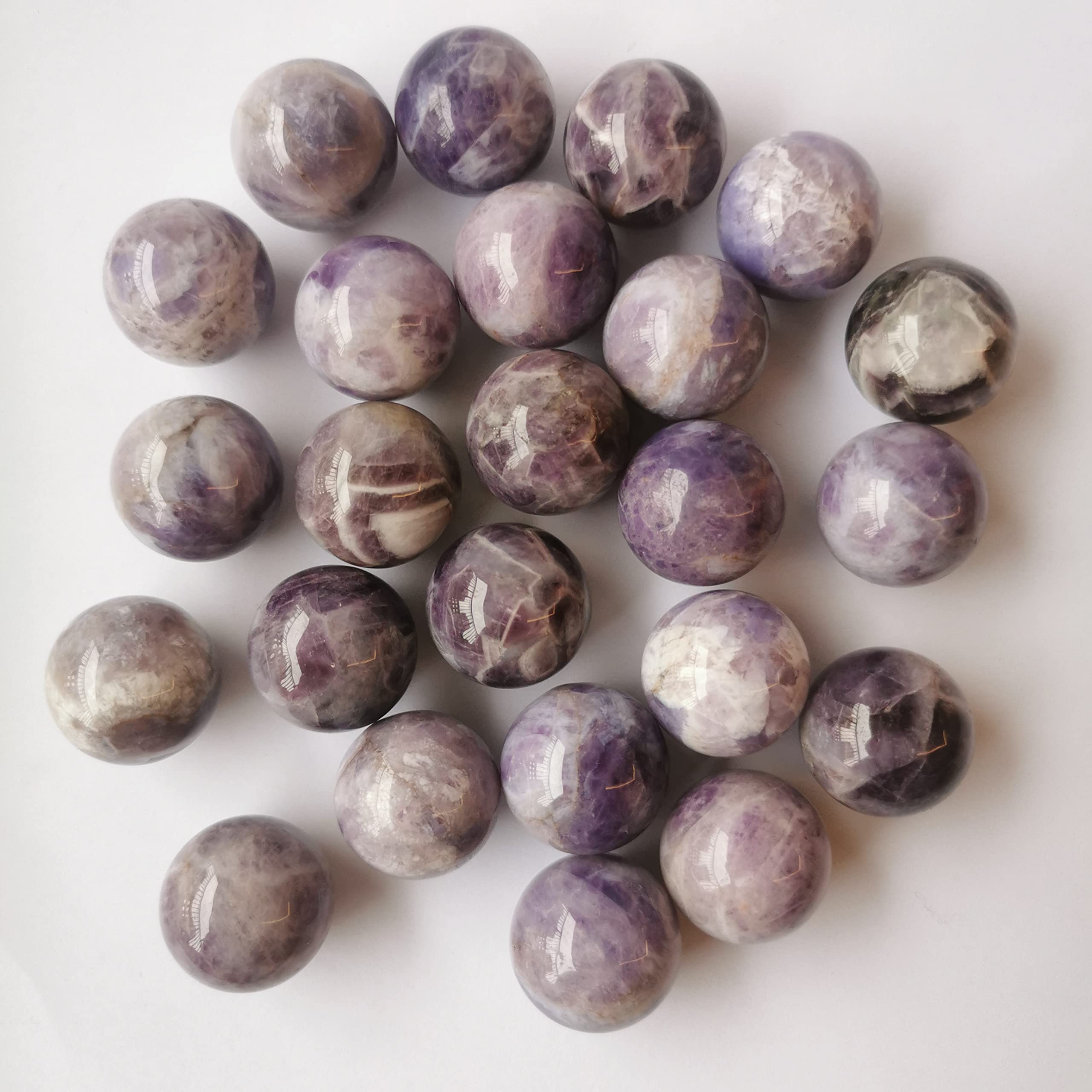 Loveliome amethyst ball feng shui accent, calming presence.