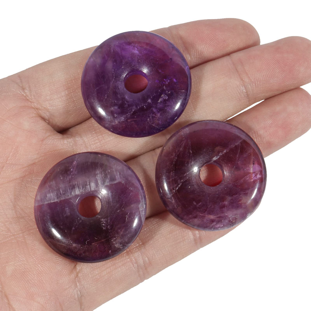 Loveliome amethyst donut pendant, hand carved, perfect for DIY jewelry projects.