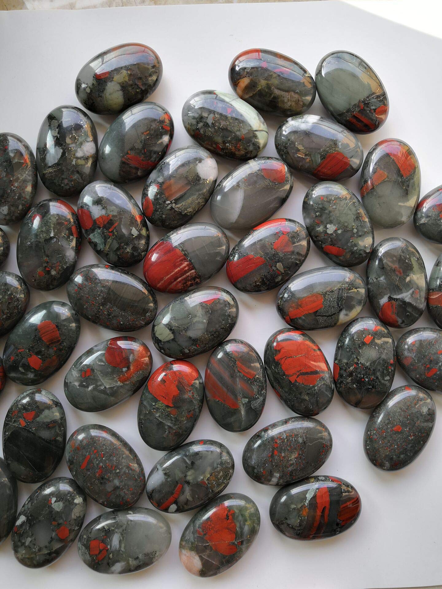 Loveliome bloodstone oval worry stone sized for pocket carry and daily calm