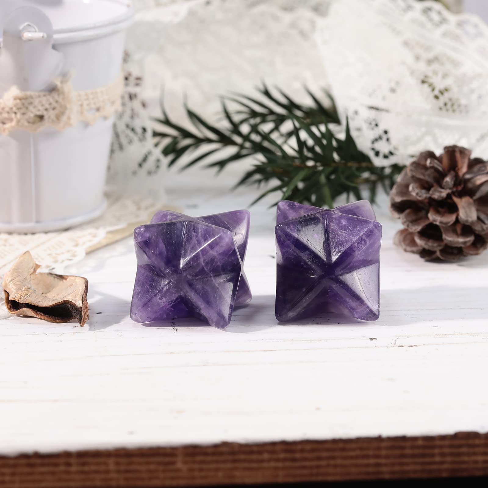 Loveliome amethyst Merkaba crystals radiate a subtle protective aura during practice