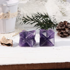 Loveliome amethyst Merkaba crystals radiate a subtle protective aura during practice