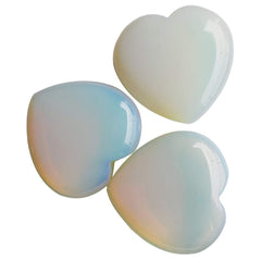 Loveliome Synthesis Opalite heart on desk as calming decorative focal point.