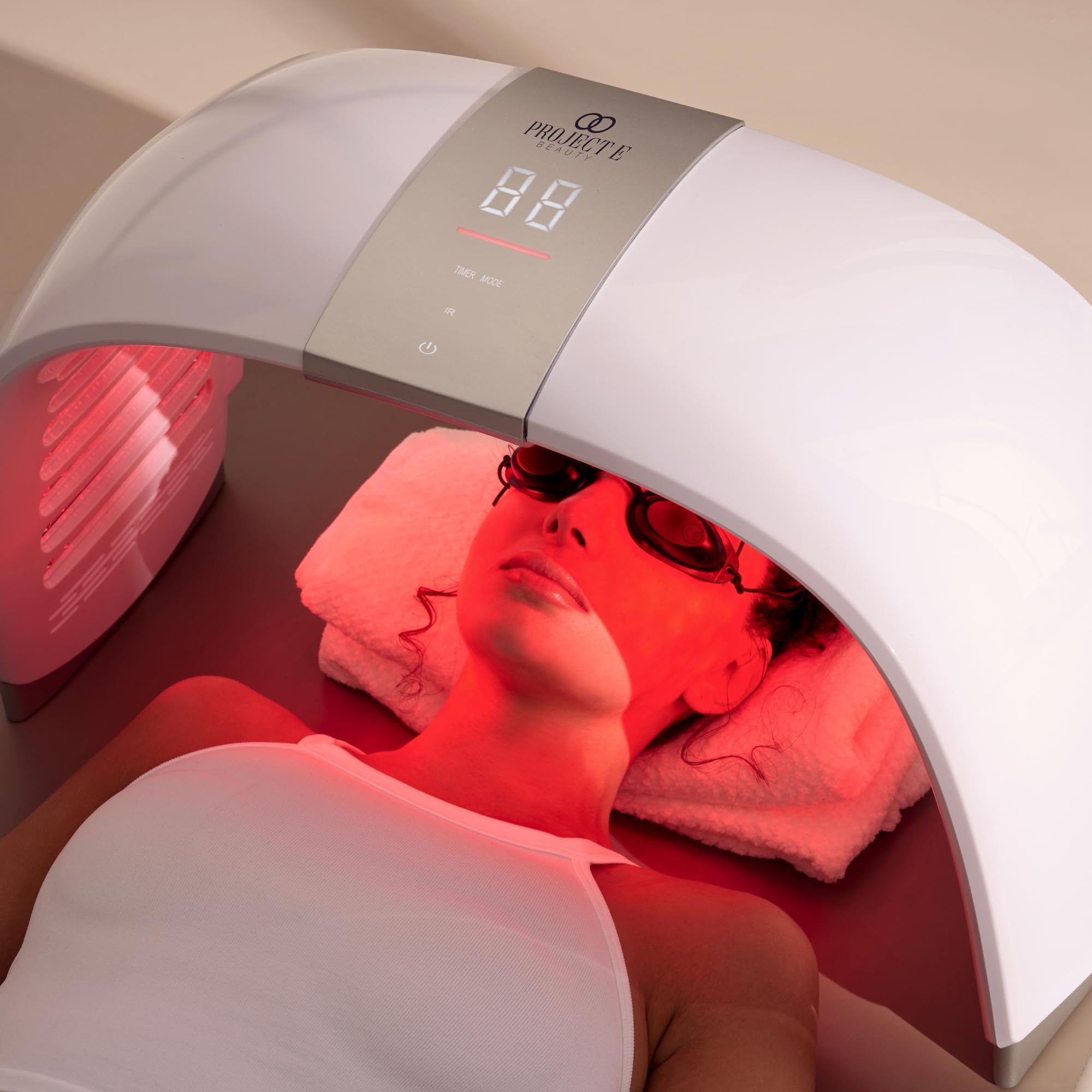 Project E Beauty Lumalux Dome face-therapy session with multi-color LEDs