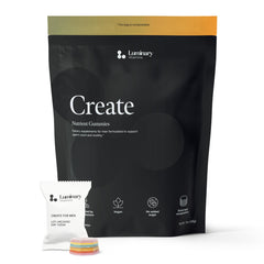 Luminary Create for Men bottle front with blackcurrant gummies for daily support