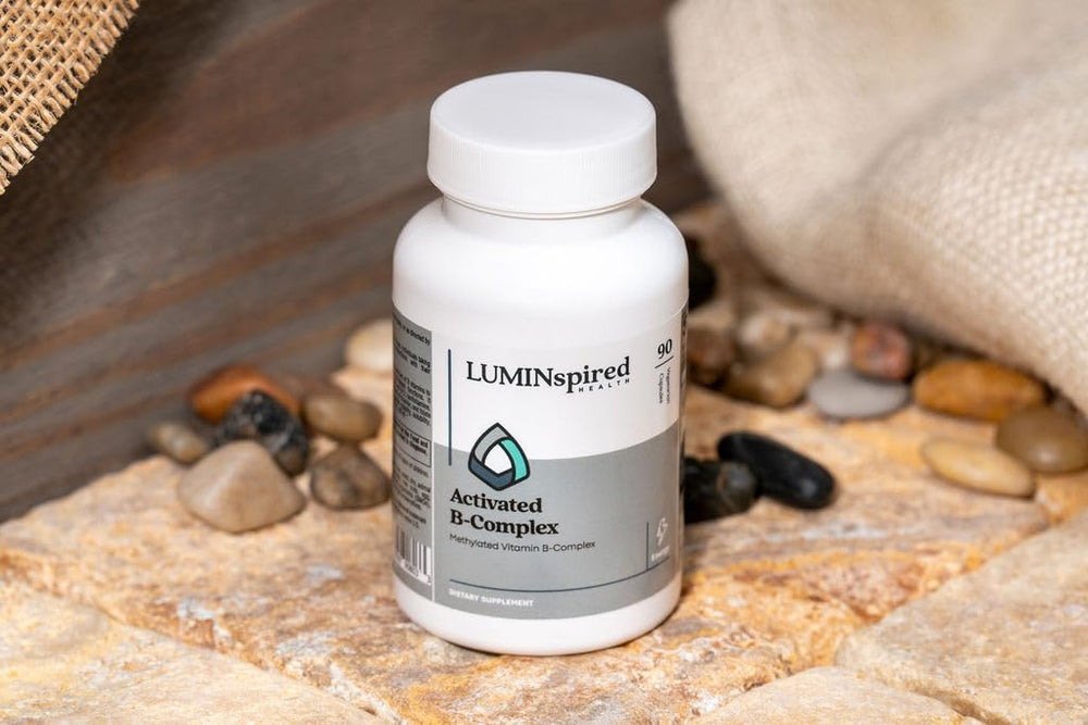 LUMINSPIRED Health capsule in hand illustrating convenient daily use for busy lifestyles.