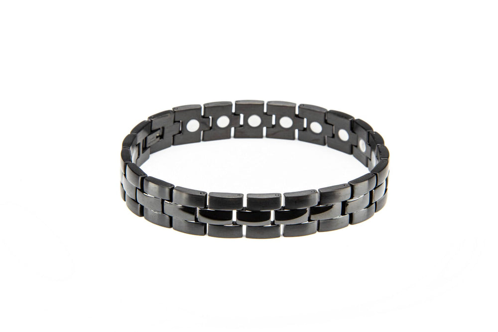 MagneHealth stainless steel bracelet close-up highlighting durable black high-gloss finish