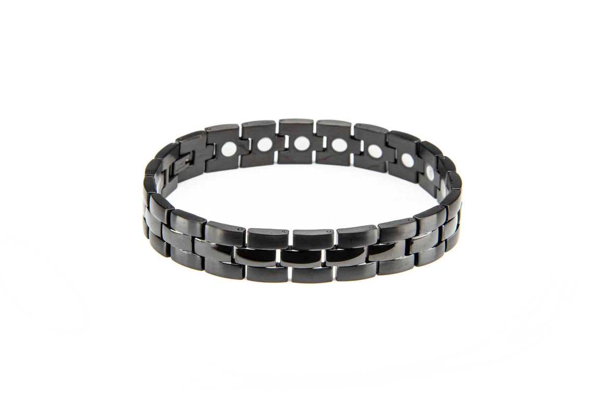 MagneHealth stainless steel bracelet close-up highlighting durable black high-gloss finish