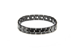 MagneHealth stainless steel bracelet close-up highlighting durable black high-gloss finish