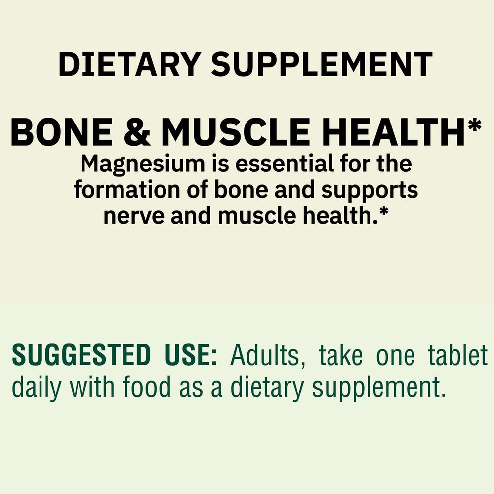 Magnesium oxide 400mg tablet at a desk for focus.