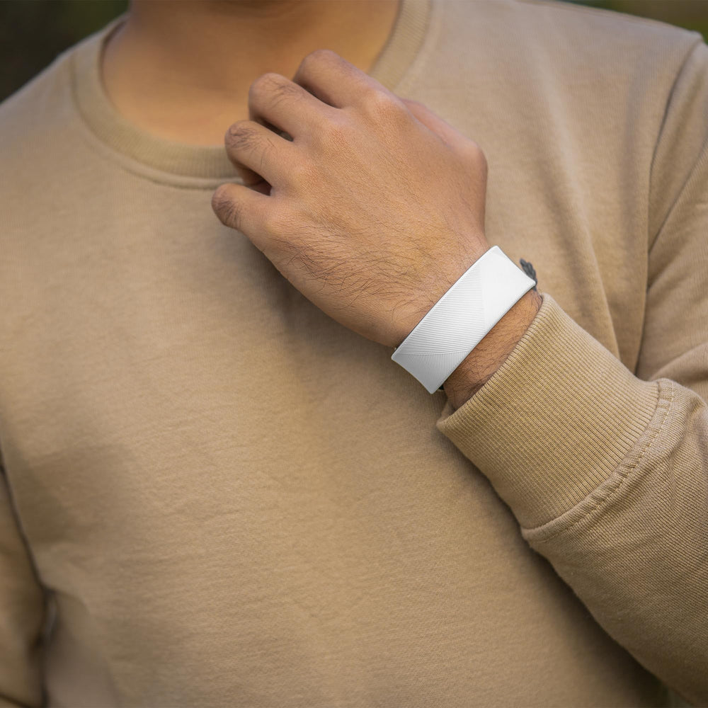 MagnetRX waterproof silicone bracelet on wrist for active, water-friendly wear.