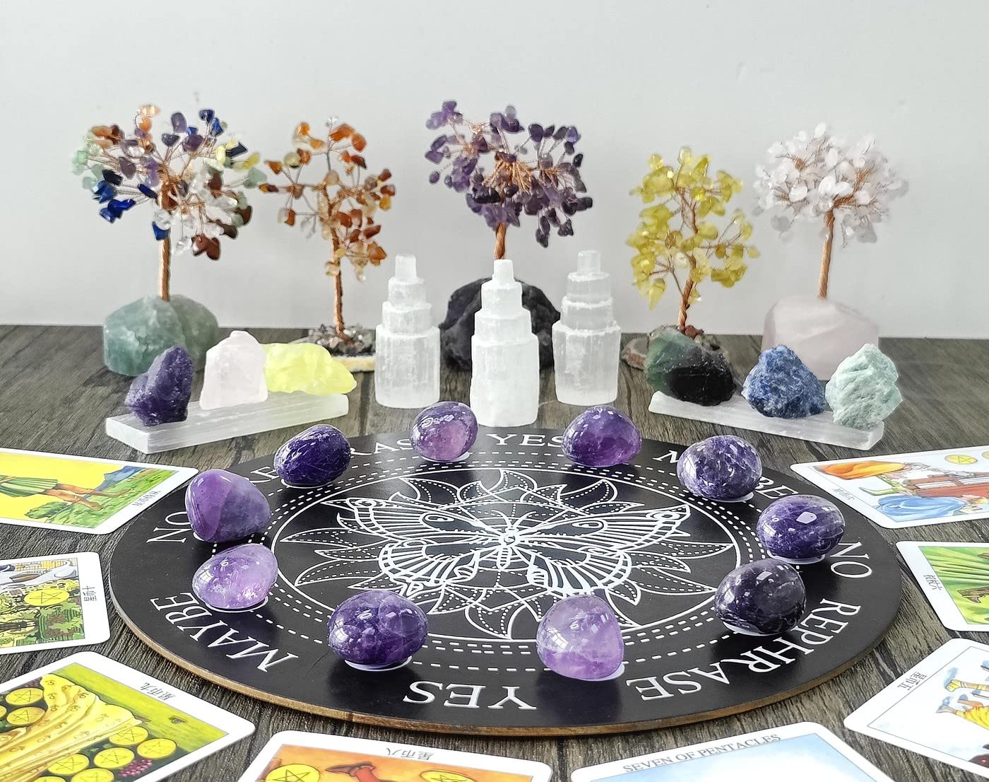 Amethyst crystals set up for meditation to invite focus.