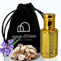Maison d'Orient Shadow Flux bottle with bold woody oil for on-the-go scent