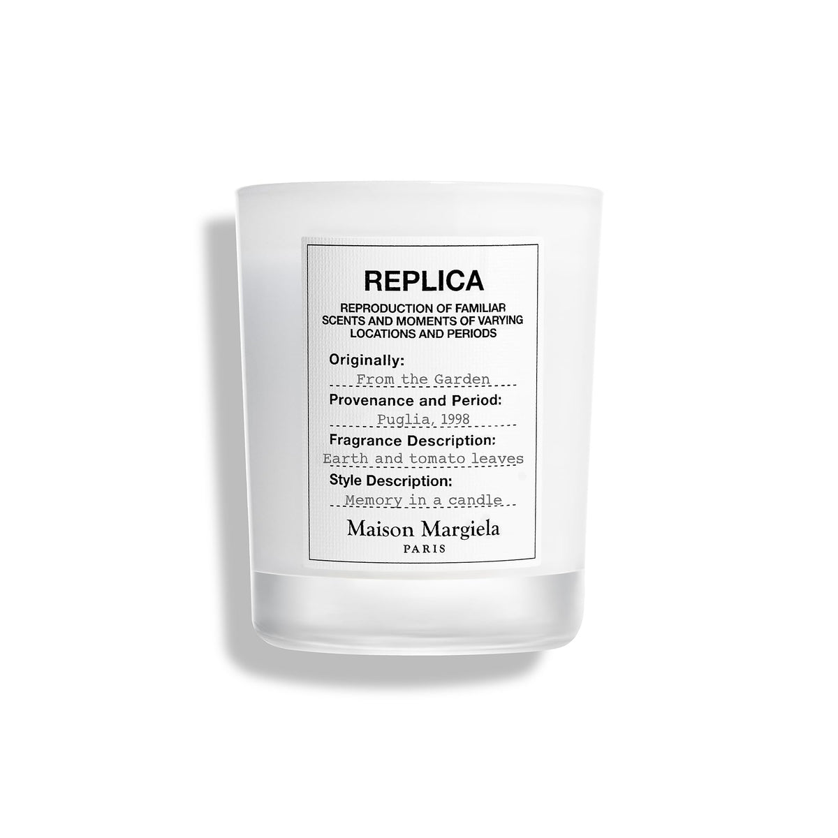 Maison Margiela Replica From The Garden Candle with tomato leaf note brightening the room
