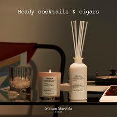 Diffuser bottle and sleek design add elegance to a home jazz lounge.
