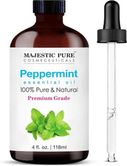 Majestic Pure Aceite de Menta en botella ámbar para aromaterapia refrescante.