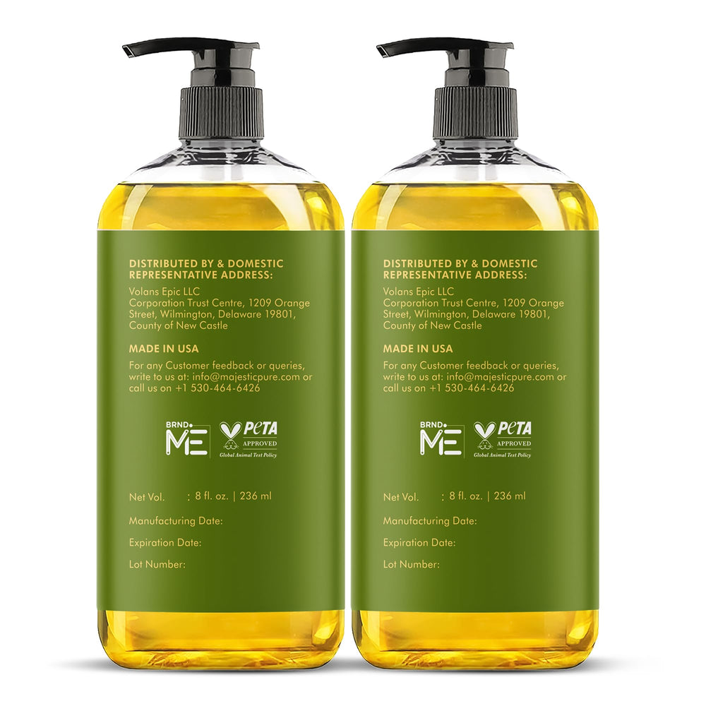 Label close-up of Majestic Pure Arnica massage oil highlighting skin-friendly formula.