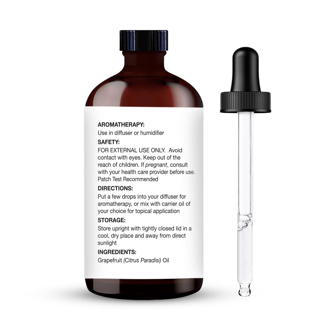 Closeup of Majestic Pure grapefruit oil dropper for accurate measurements.