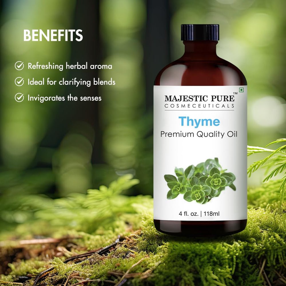 Majestic Pure Thyme Oil near soap making station for DIY projects