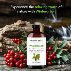 Majestic Pure Wintergreen oil drops into a diffuser for a fresh aroma.