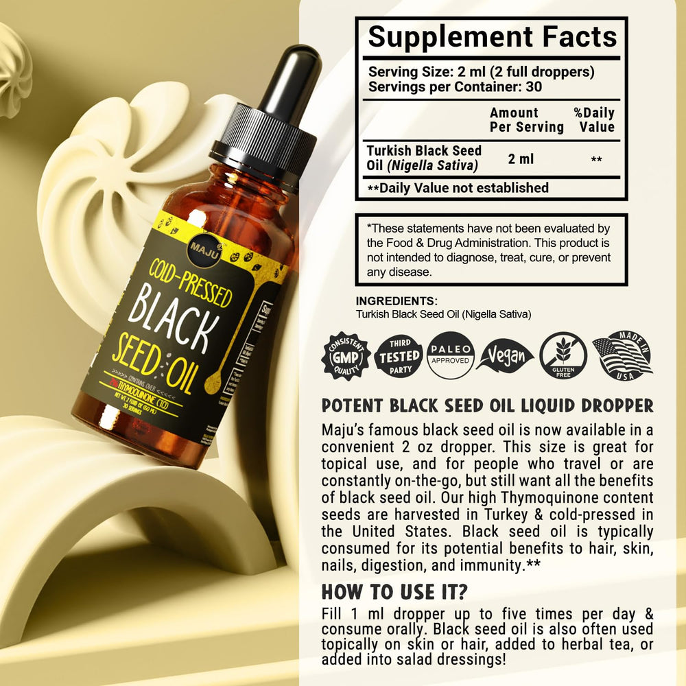 Maju Black Seed Oil label detail showcases the brand and cold-pressed process